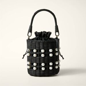 Elegant Black Woven Bag with Pearl Accents